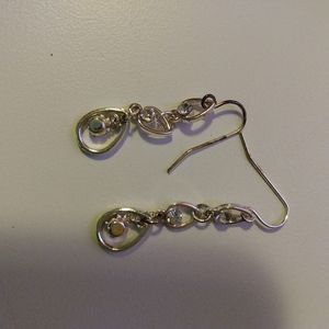 Silver dangle earrings with clear stones